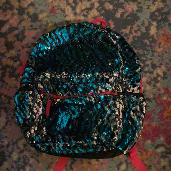 Blue, silver and black flip sequence backpack - Picture 2 of 3